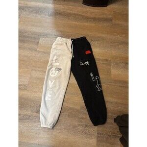 chnge split color “teach peace” sweatpants